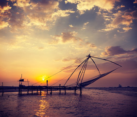 Fototapeta na wymiar Chinese fishnets on sunset. Kochi, Kerala, India