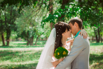 Married Couple in forest embracing