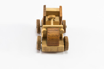 Wooden toy car miniature isolated on white background