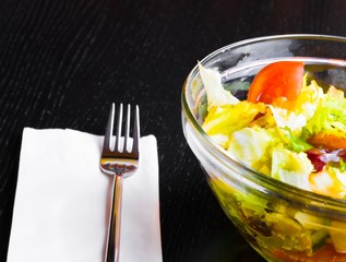 italian fresh salad and tomato on wood restaurant table