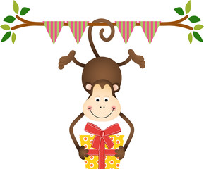 Hanging monkey holding a birthday gift
