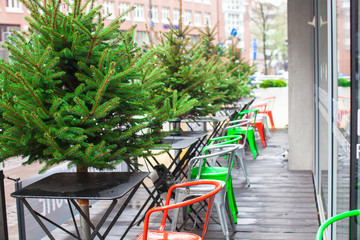 Fototapeta na wymiar Outdoor cafe in european city at Christmas time