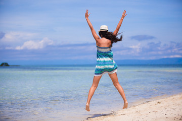 Young beautiful woman have fun in the beach