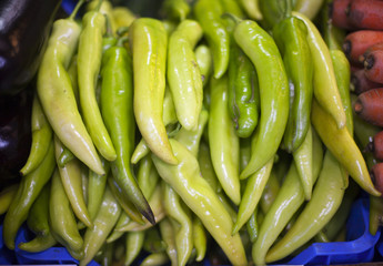 Hot green peppers in raw at a farmers market