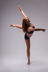 Fototapeta premium Woman gymnast stretching