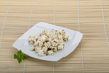 Cheese with spices and oil