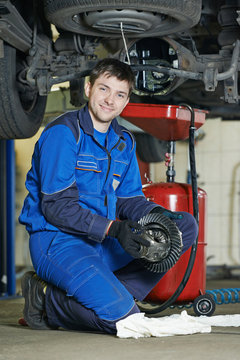smiling repairman auto mechanic