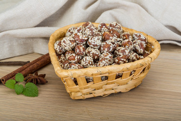 Peanut in honey with sesame seeds