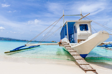 philippino-style wooden sail boat, boracay island, tropical summ