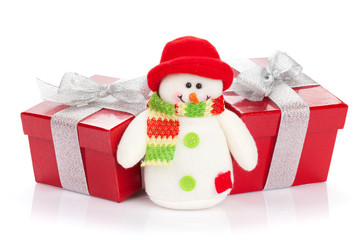 Christmas gift boxes and snowman toy