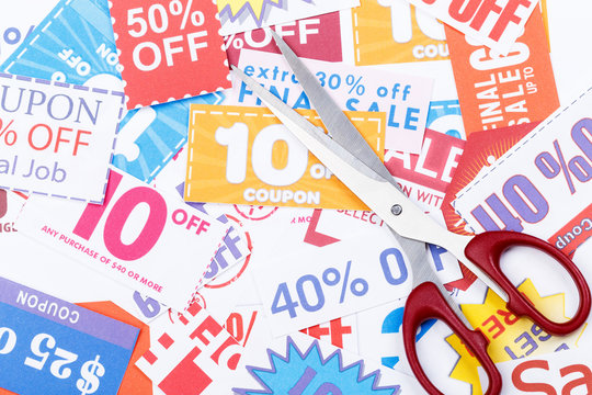 Money saving coupon vouchers with scissors