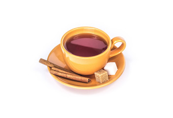 Orange mug with cinnamon and sugar