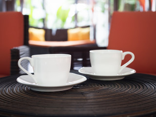 Two cup of coffees interior background