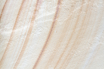 Patterned sandstone texture background.