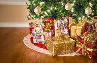 Gifts under Christmas tree, closeup