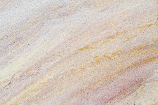 Patterned sandstone texture background.