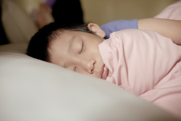 Fototapeta na wymiar Asian boy sleeping.