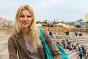 Attractive girl inside the Arena of Verona - the place of annual