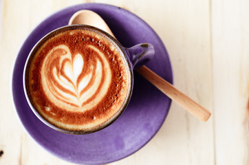 Latte art, Blue coffee cup on wooden background