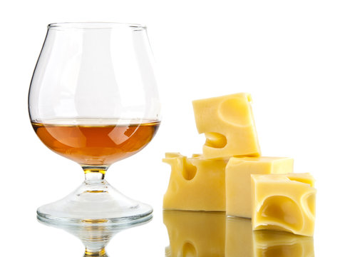 glass of cognac and cheese