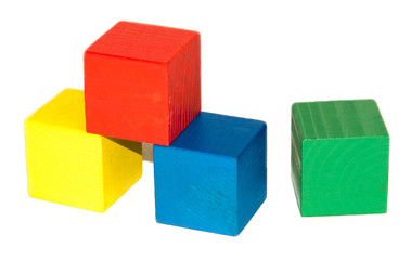 Coloured wooden cubes on white background