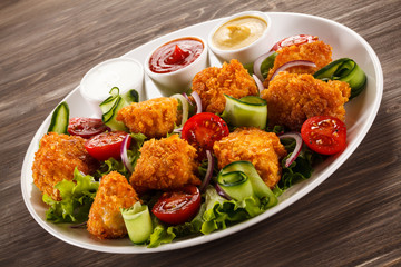 Grilled chicken nuggets and vegetables