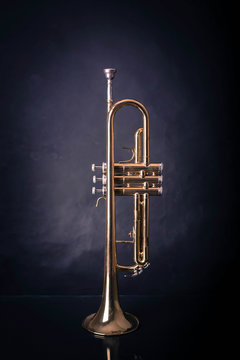 Trumpet on wrinkled background