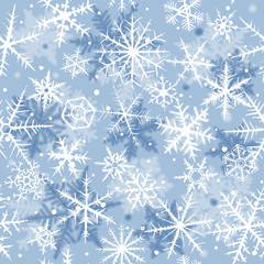 Seamless background with beautiful various snowflakes.