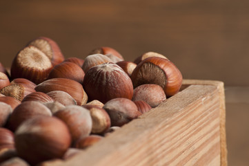 Hazelnut in wooden box.