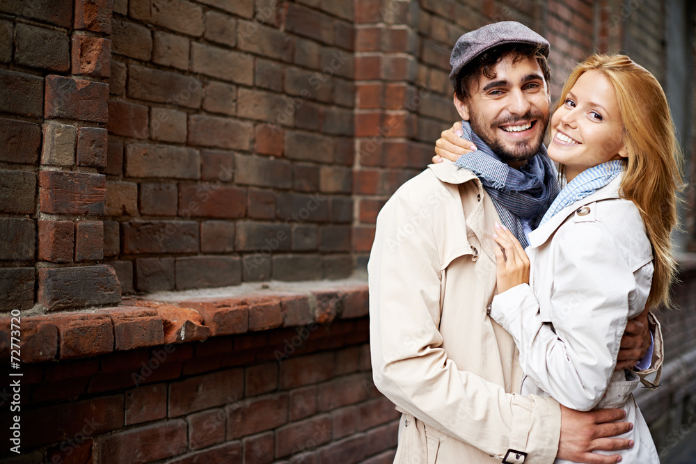 Poster couple in trench-coats