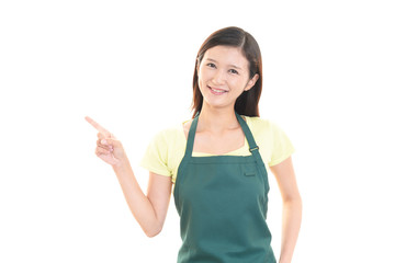 Fototapeta premium エプロンを着た笑顔の女性
