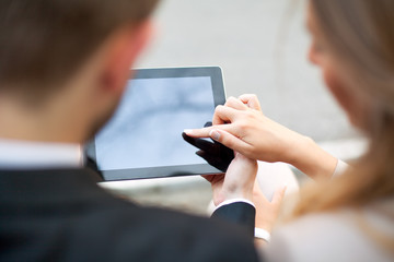 Business people with digital tablet