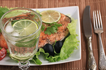 grilled salmon with salad and nuts