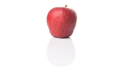 Red apples over white background