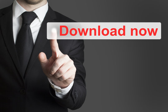 businessman pushing flat touchscreen button download now