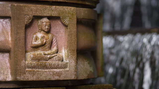 Antique stone carving of buddha.