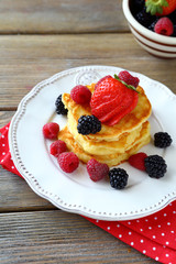 stack of pancakes with berries