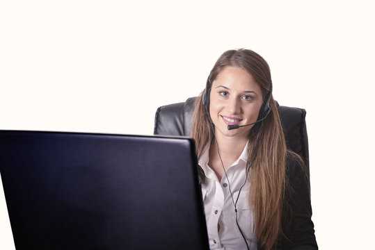 Female customer support operator with headset and smiling