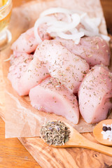 Seasoned raw chicken breast fillets