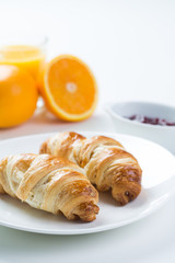 delicious breakfast with croissants and juice