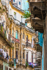 Fototapeta premium Shabby crumbling old buildings in Old Havana