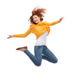 smiling young woman jumping in air