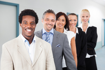 Multiethnic Businesspeople Smiling At Office