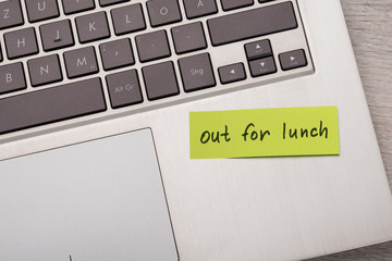 Out For Lunch Sticky Note On Laptop