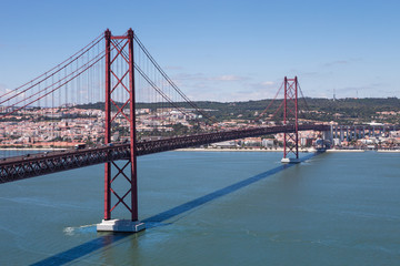 The 25 De Abril Bridge Over River Tejo