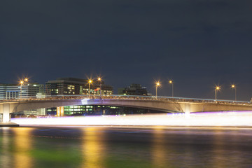 Fototapeta na wymiar Bridge and the lights of the boat.