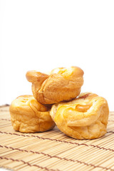 Loaf of bread on wooden plate