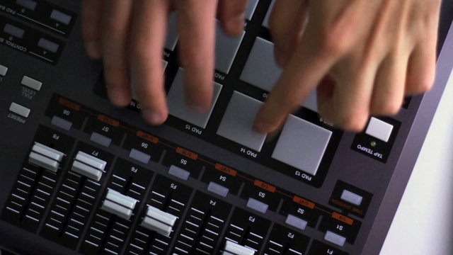 DJ Using His Drum Machine