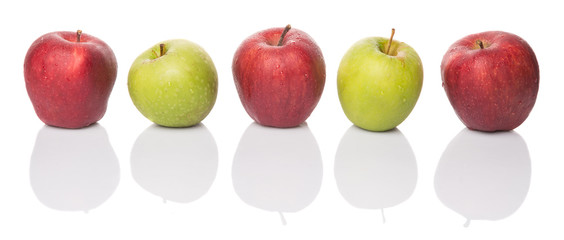 Red and green apple over white background