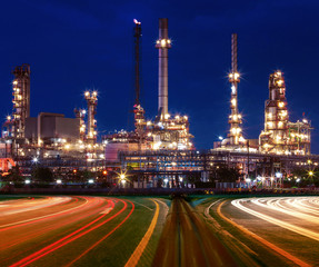 Fototapeta na wymiar beautiful lighting of oil refinery plant in industry estate agai